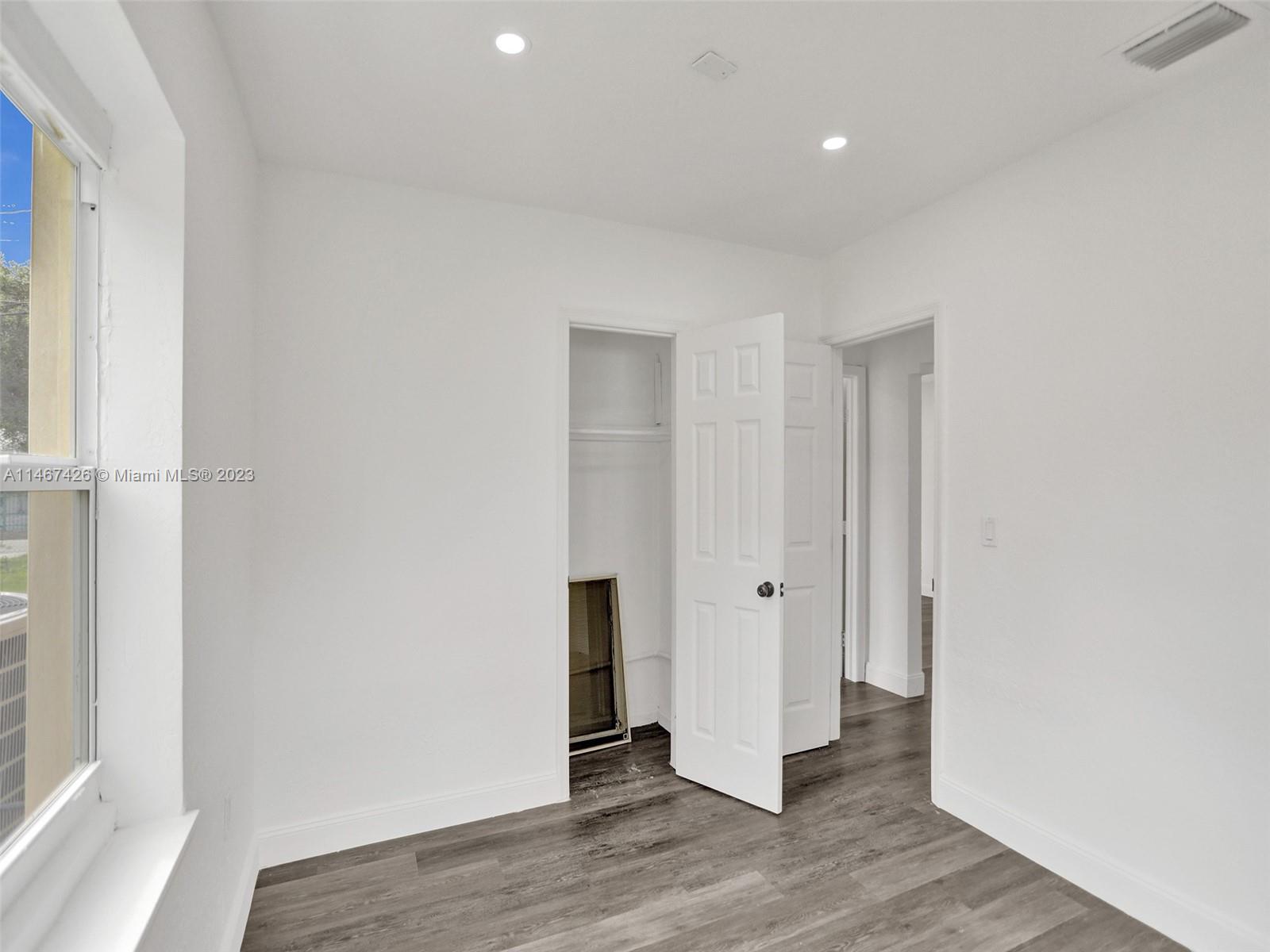 167 Northwest 84th Street Miami, FL 33150 - Photo 23 of 39 a view of a livingroom with wooden floor