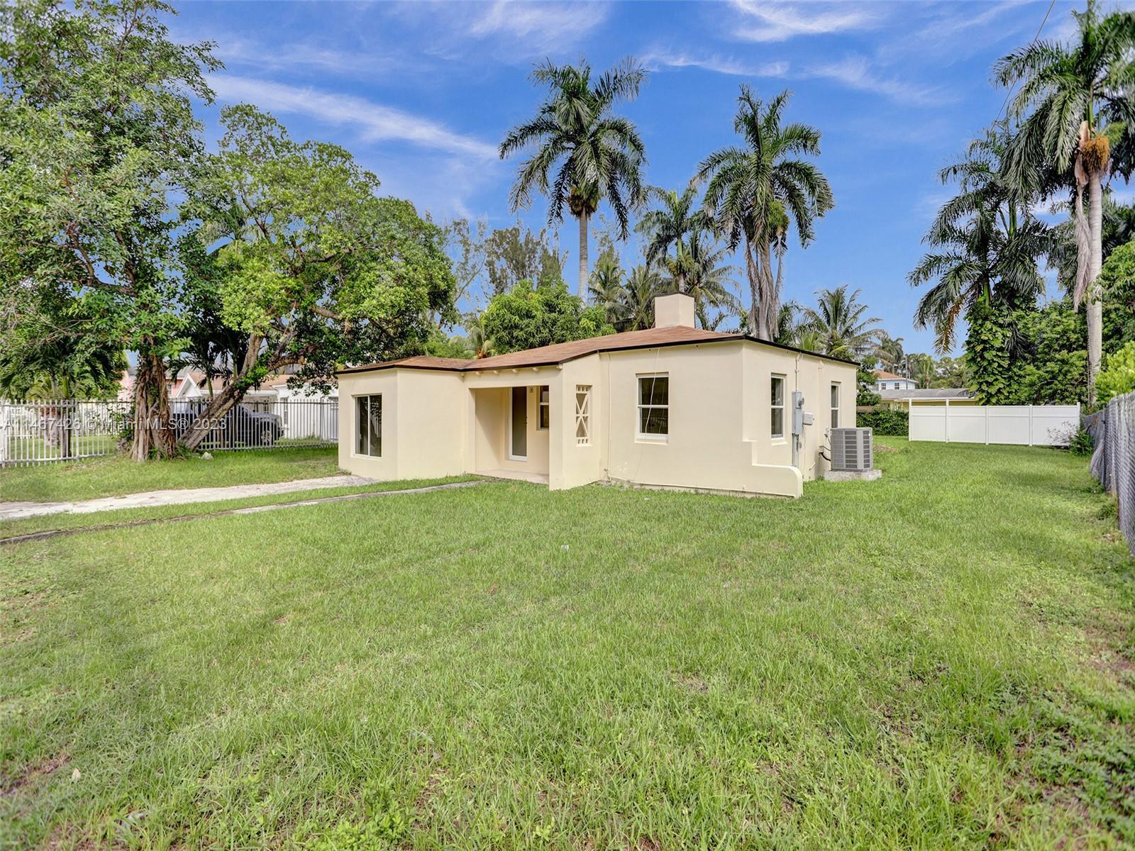 167 Northwest 84th Street Miami, FL 33150 - Photo 35 of 39 a view of a house with a backyard