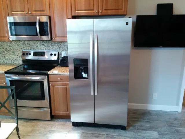 a view of a sink with wooden floor