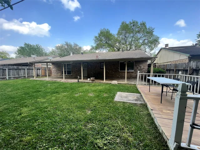 a view of backyard with green space