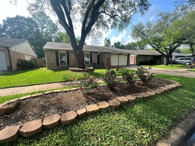 a kitchen with a stove and a sink