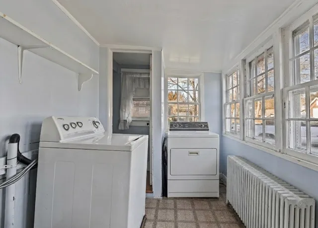 a utility room with dryer and washer
