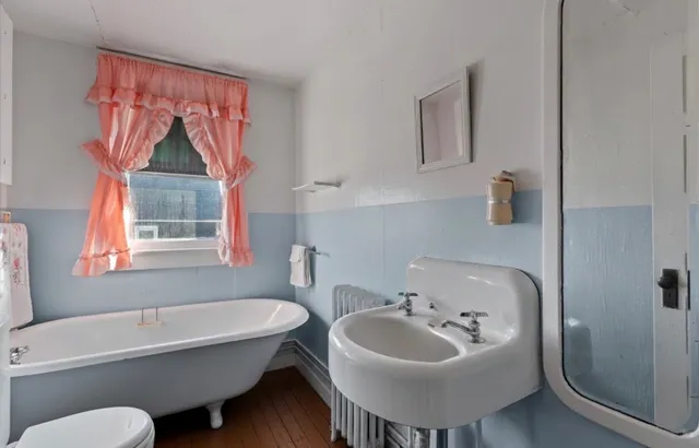 a bathroom with a sink and a bathtub