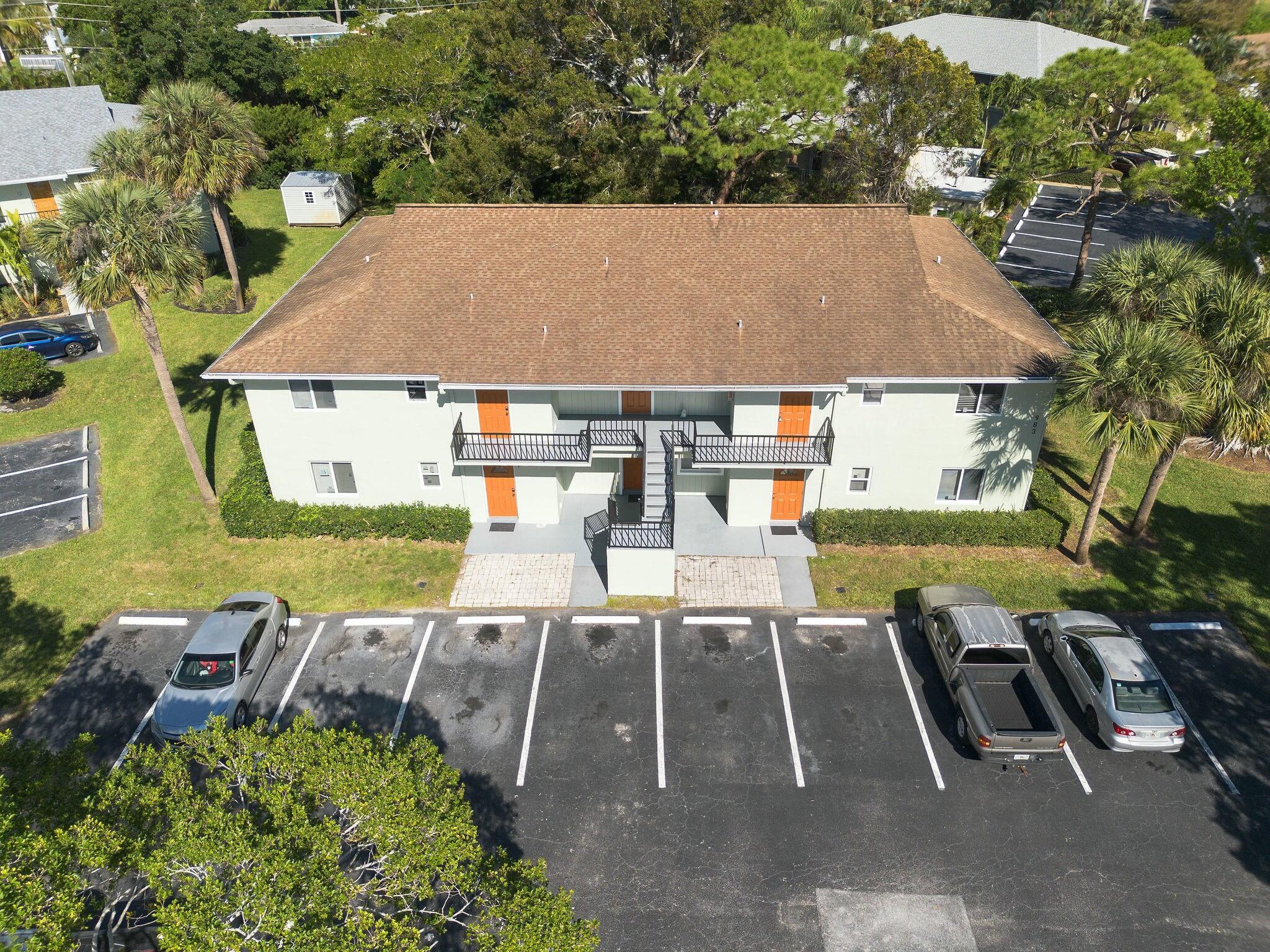983 Northwest Spruce Ridge Drive, Unit 4 Stuart, FL 34994 - Photo 36 of 56 an aerial view of a house with swimming pool and patio