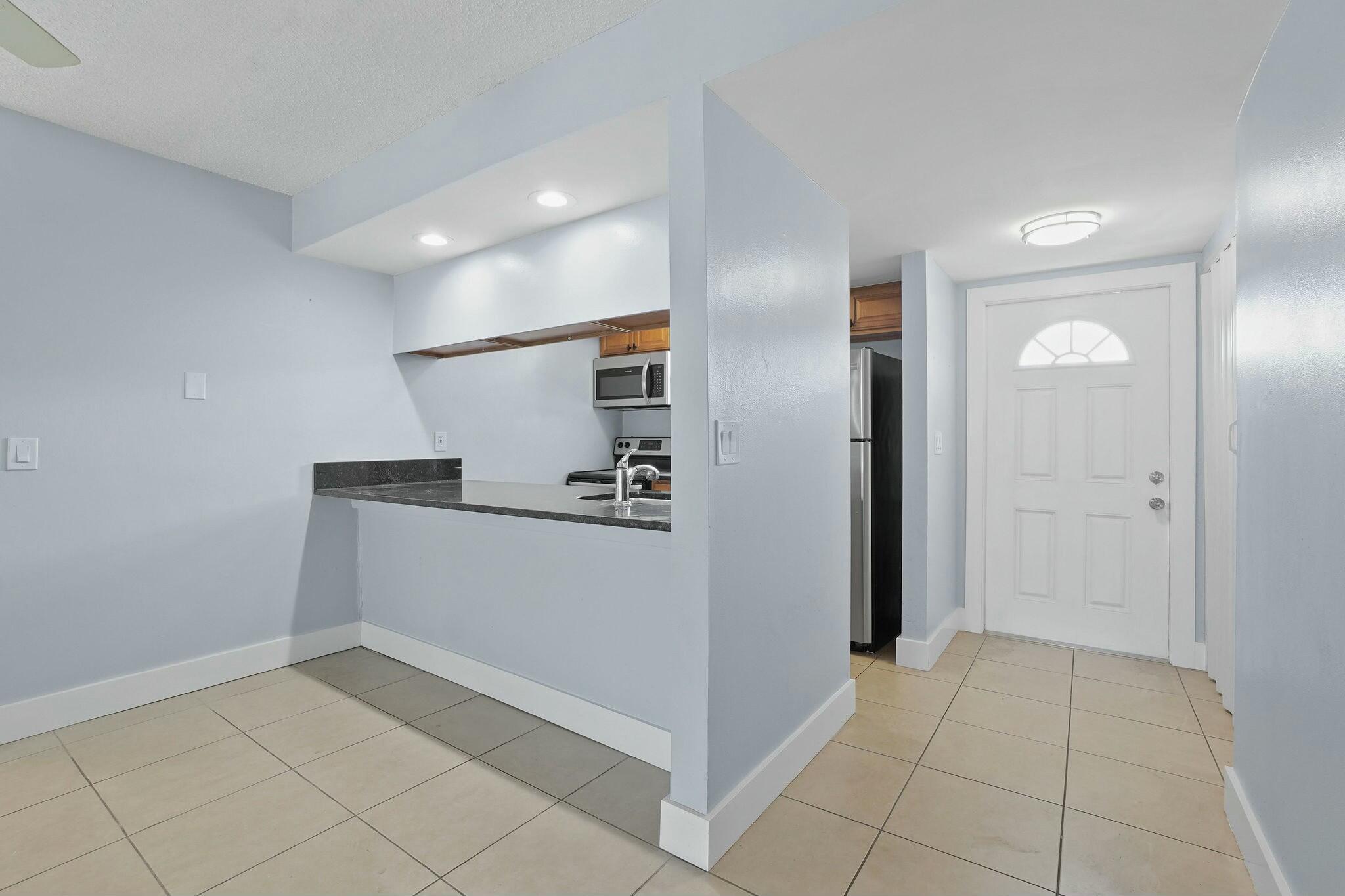 983 Northwest Spruce Ridge Drive, Unit 4 Stuart, FL 34994 - Photo 9 of 56 tempImageWNr5R7
