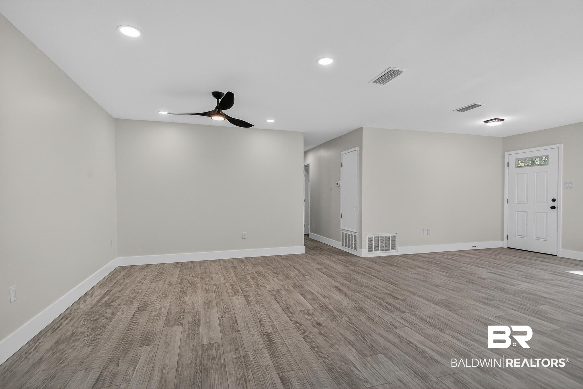 10650 Old Pascagoula Road Theodore, AL 36582 - Photo 17 of 77 Empty room with light wood-type flooring, recessed lighting, and a ceiling fan