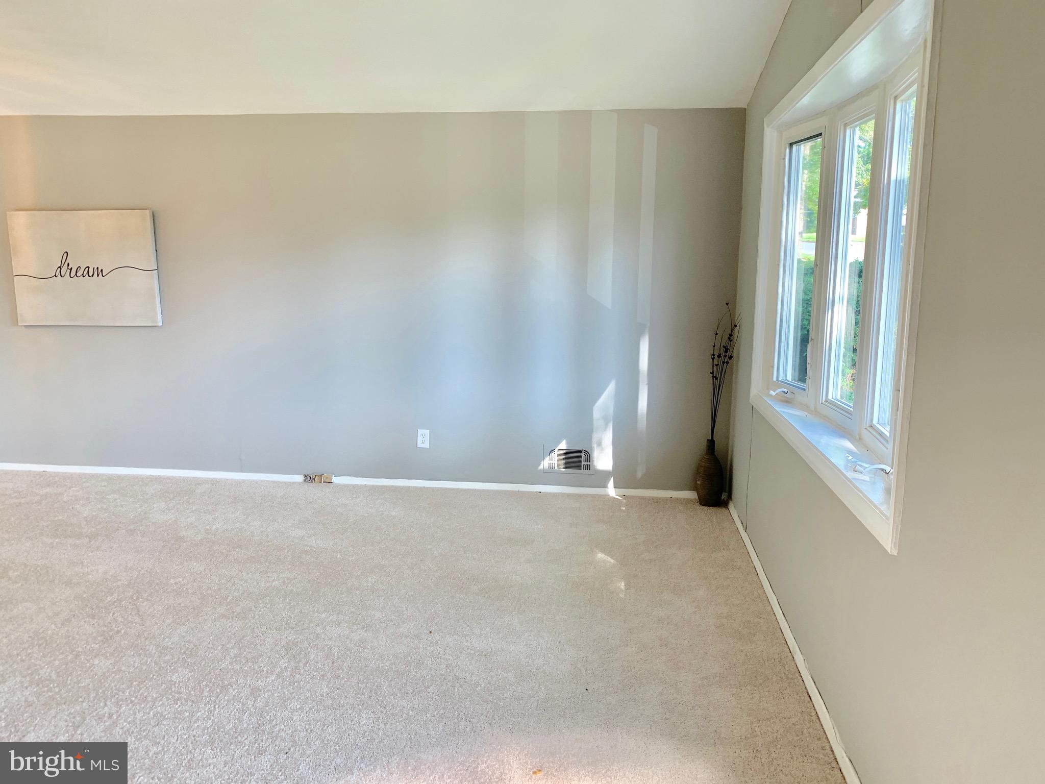 8508 Stevenswood Road Baltimore, MD 21244 - Photo 3 of 45 an empty room with windows