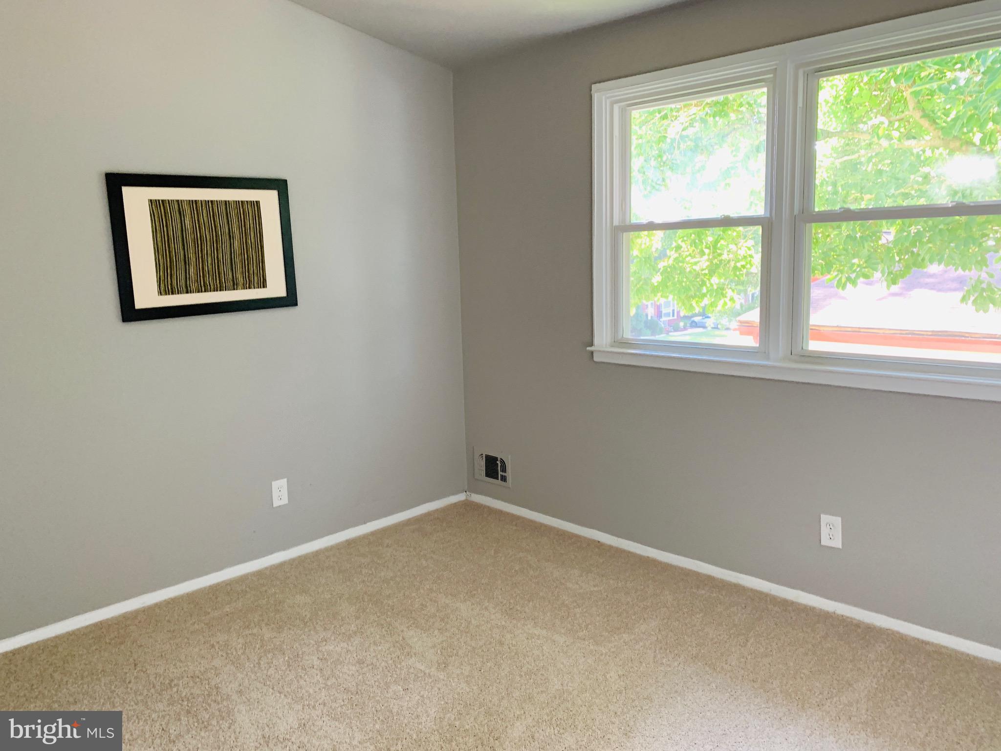 8508 Stevenswood Road Baltimore, MD 21244 - Photo 21 of 45 a view of an empty room with a window