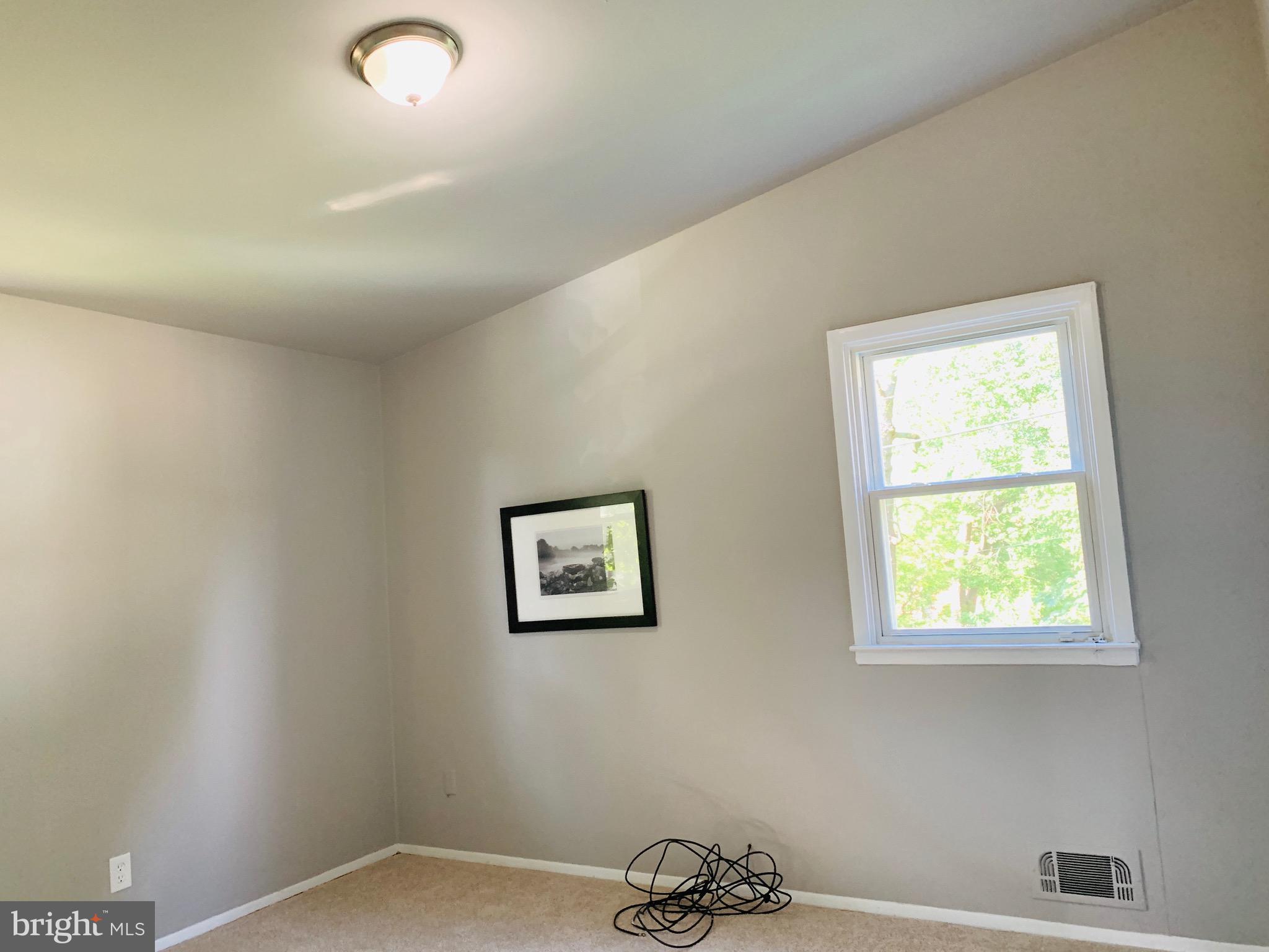 8508 Stevenswood Road Baltimore, MD 21244 - Photo 23 of 45 a view of a workspace with a window