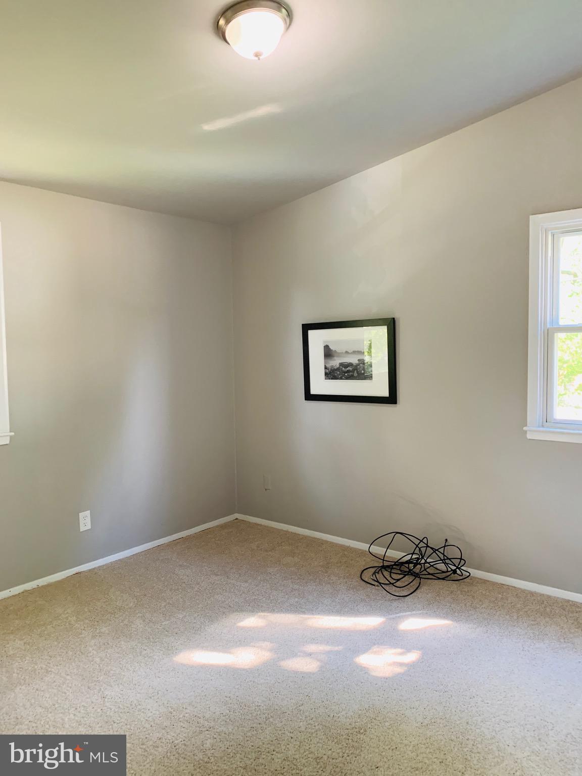 8508 Stevenswood Road Baltimore, MD 21244 - Photo 24 of 45 a view of a room with blue walls