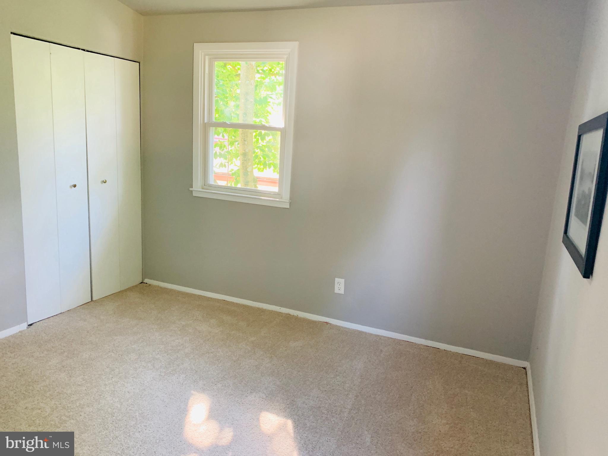 8508 Stevenswood Road Baltimore, MD 21244 - Photo 26 of 45 a view of an empty room with a window