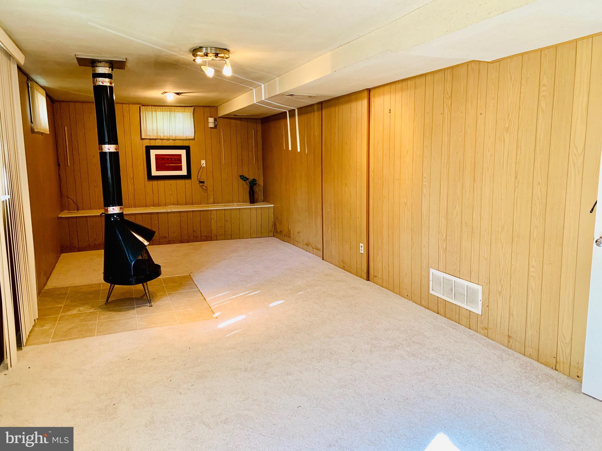 8508 Stevenswood Road Baltimore, MD 21244 - Photo 29 of 45 a view of an empty room and a window