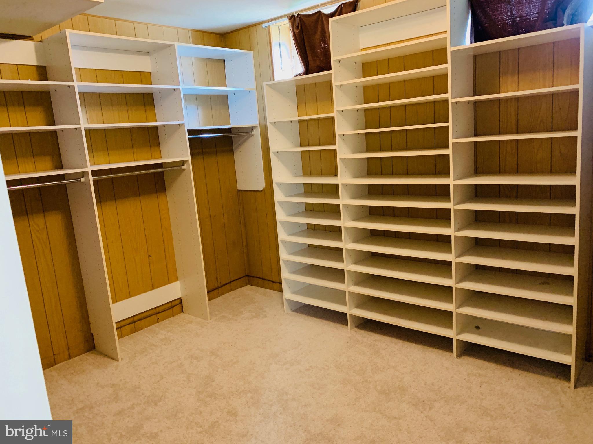 8508 Stevenswood Road Baltimore, MD 21244 - Photo 32 of 45 a view of an empty room with empty shelves