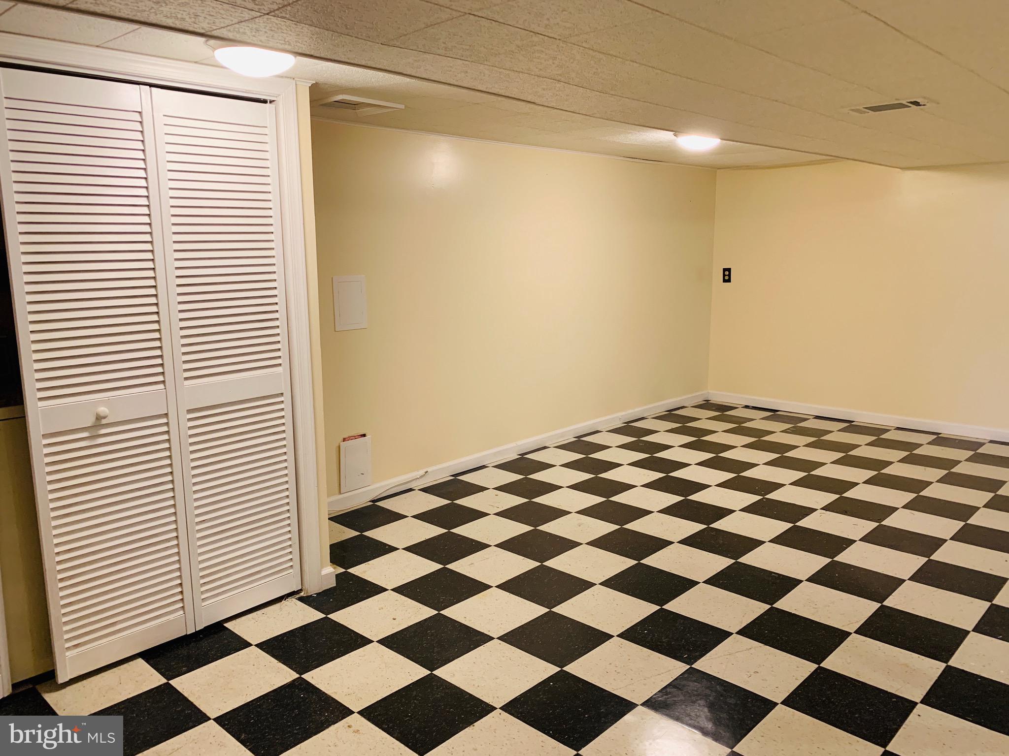 8508 Stevenswood Road Baltimore, MD 21244 - Photo 36 of 45 a black and white checkered floor
