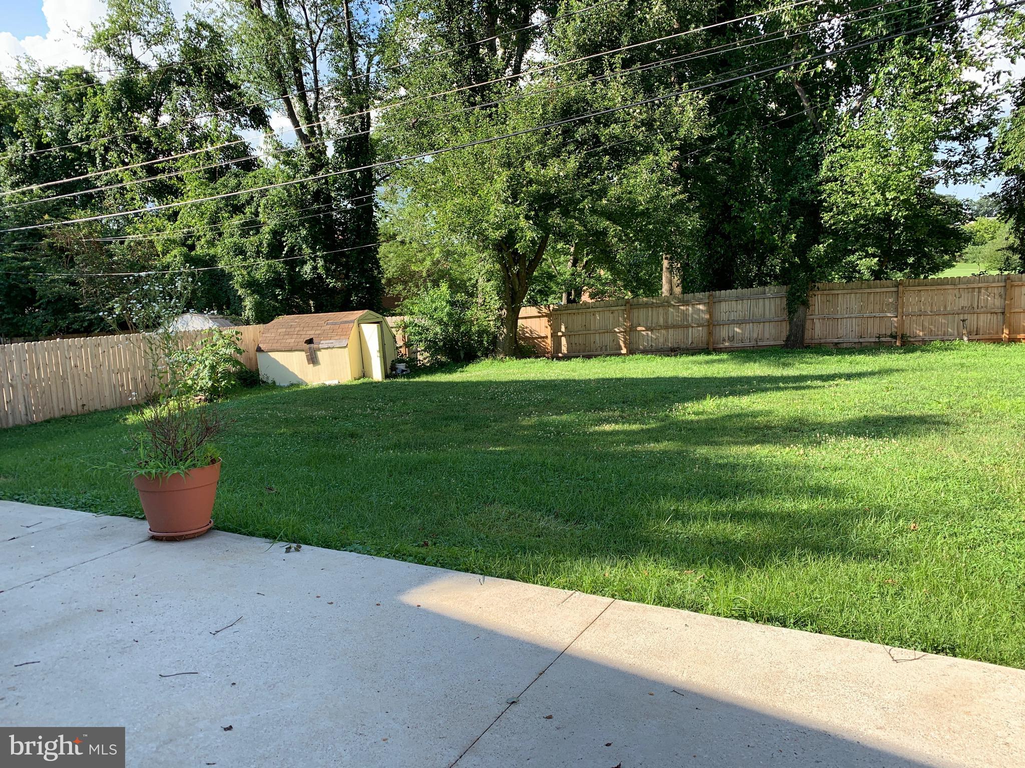 8508 Stevenswood Road Baltimore, MD 21244 - Photo 40 of 45 a view of a backyard with large tree