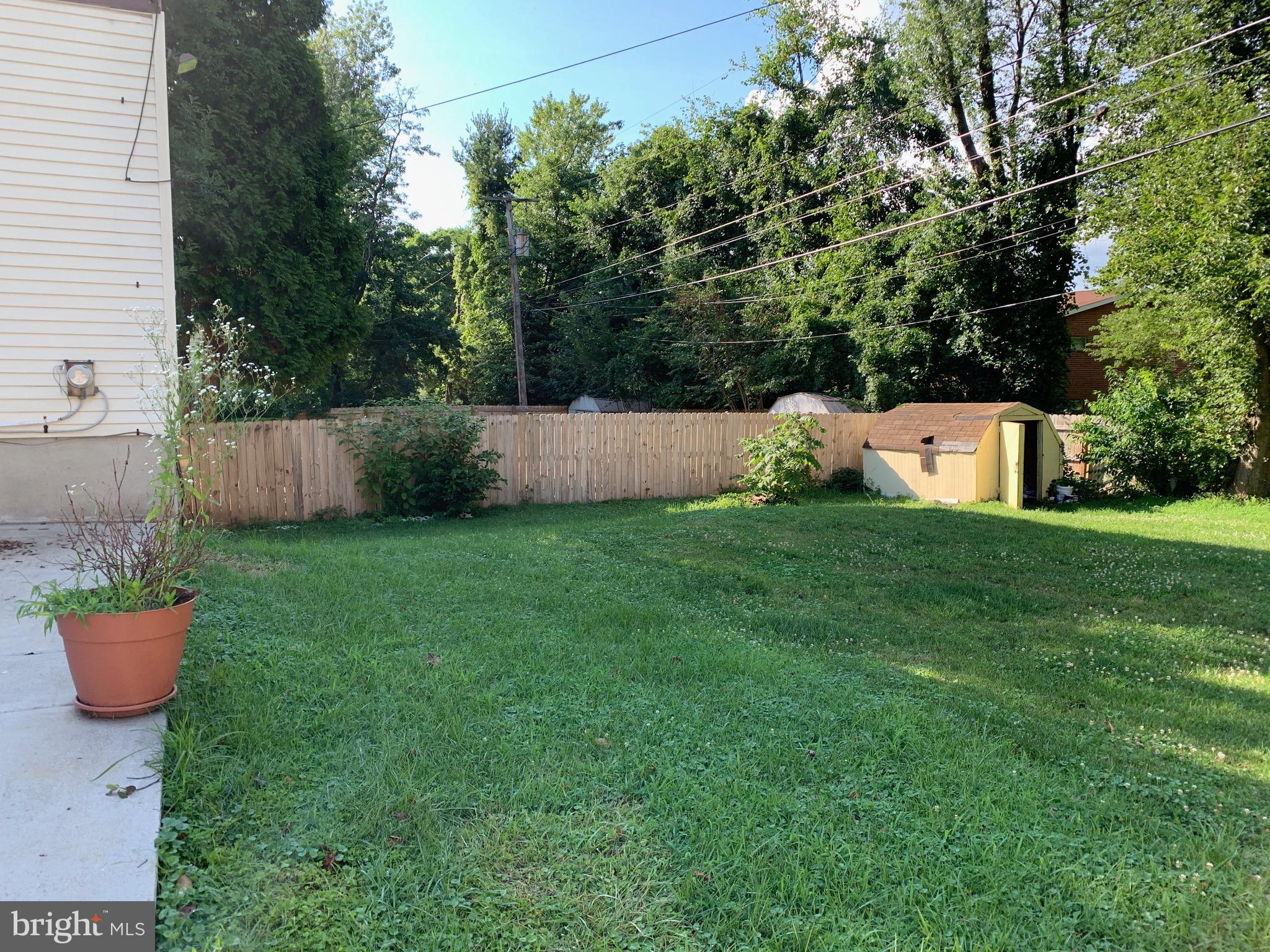 8508 Stevenswood Road Baltimore, MD 21244 - Photo 42 of 45 a view of a backyard with a sitting area