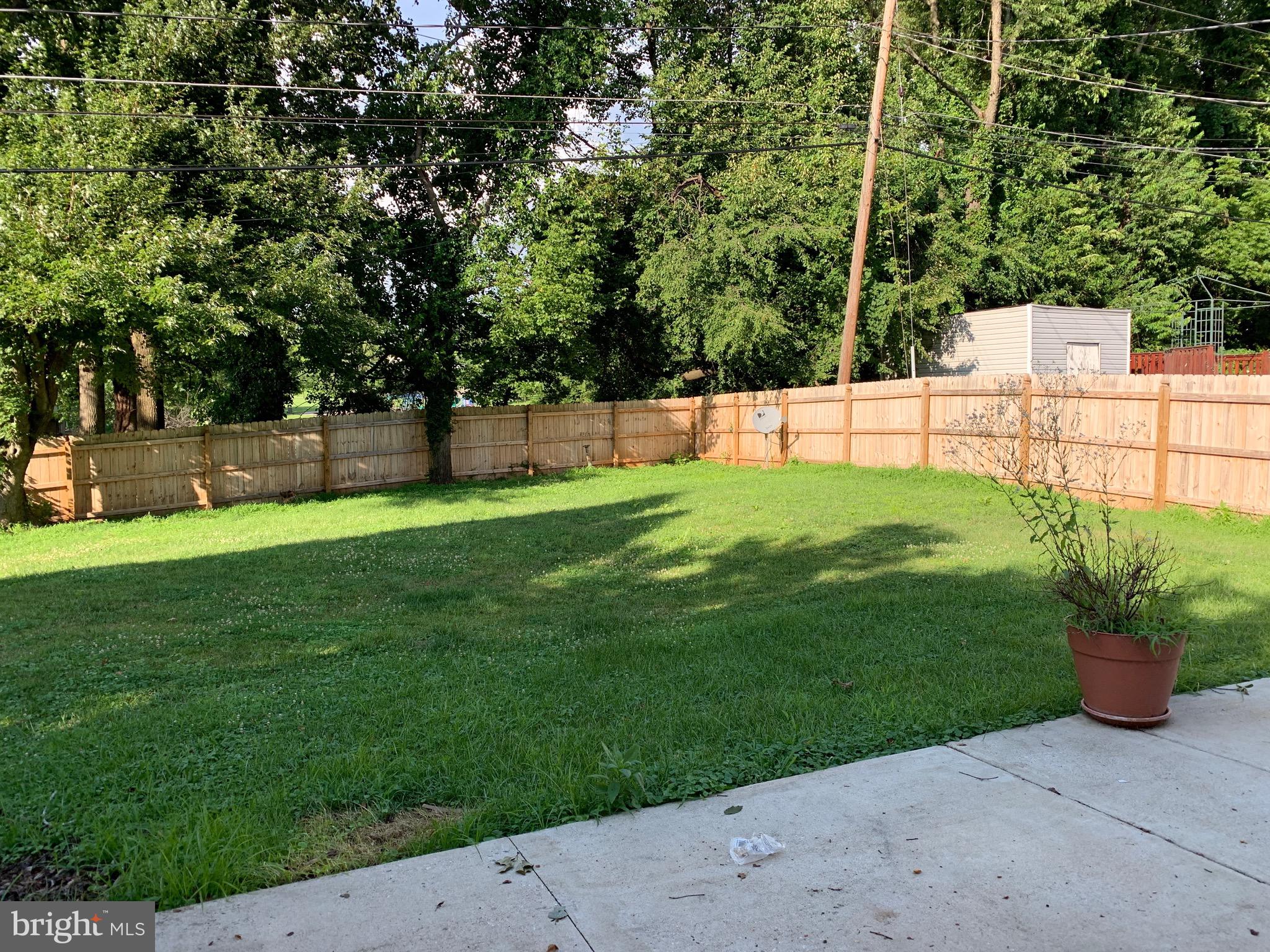 8508 Stevenswood Road Baltimore, MD 21244 - Photo 43 of 45 a view of a backyard with large trees