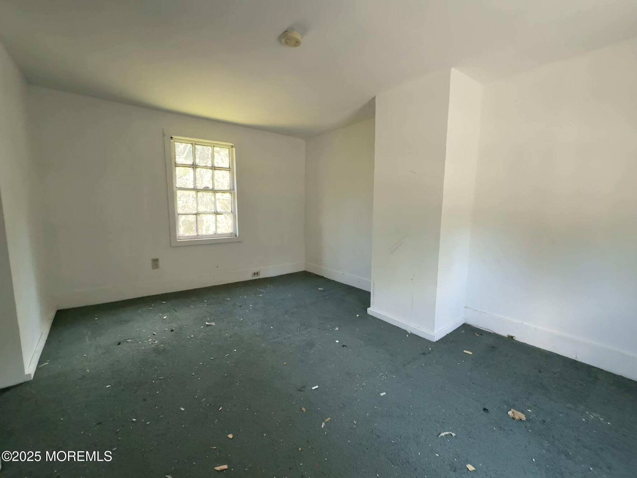 225 Jones Road, Unit 104 Barnegat, NJ 08005 - Photo 15 of 44 an empty room with a window
