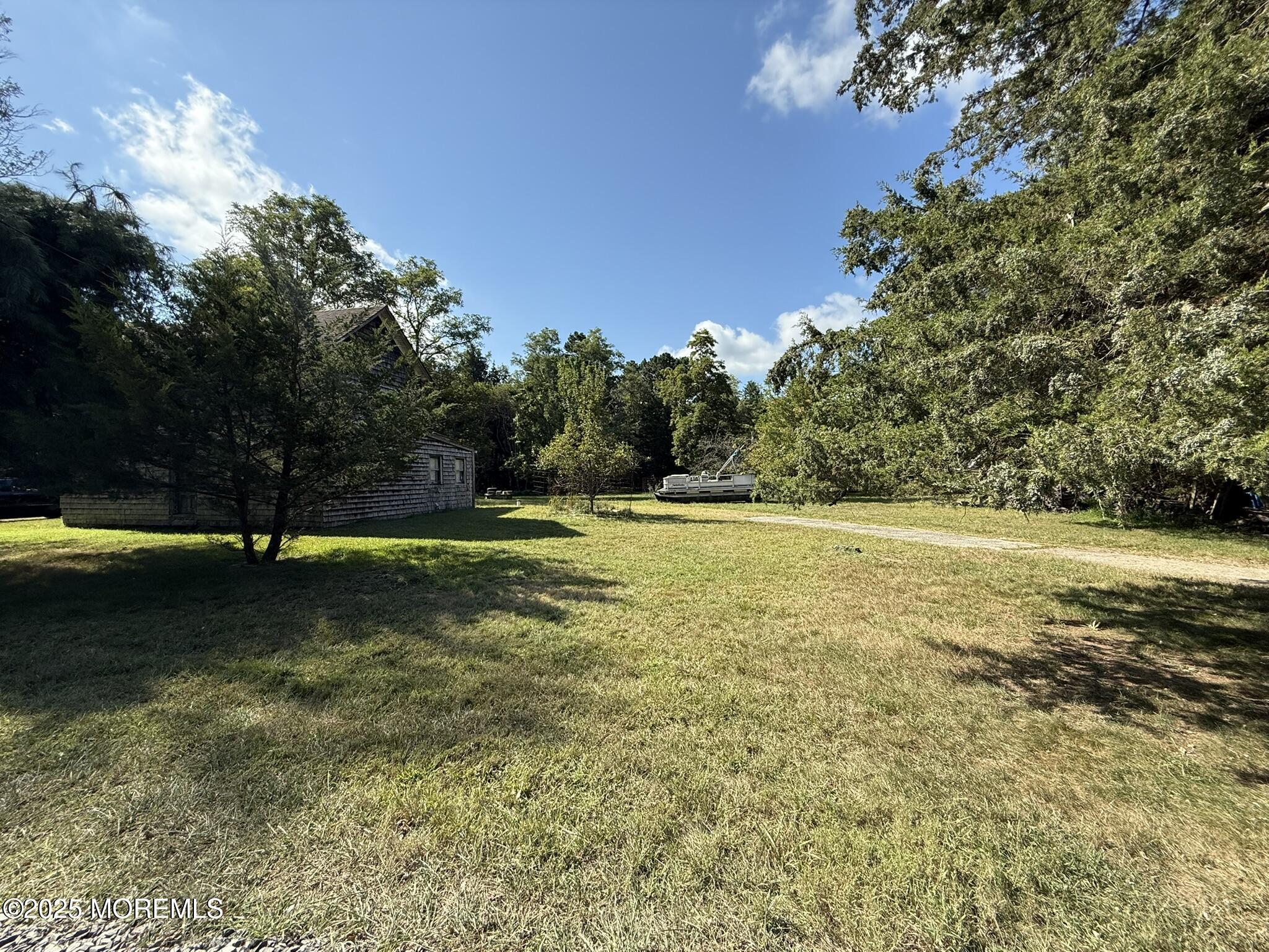 225 Jones Road, Unit 104 Barnegat, NJ 08005 - Photo 20 of 44 a view of a yard
