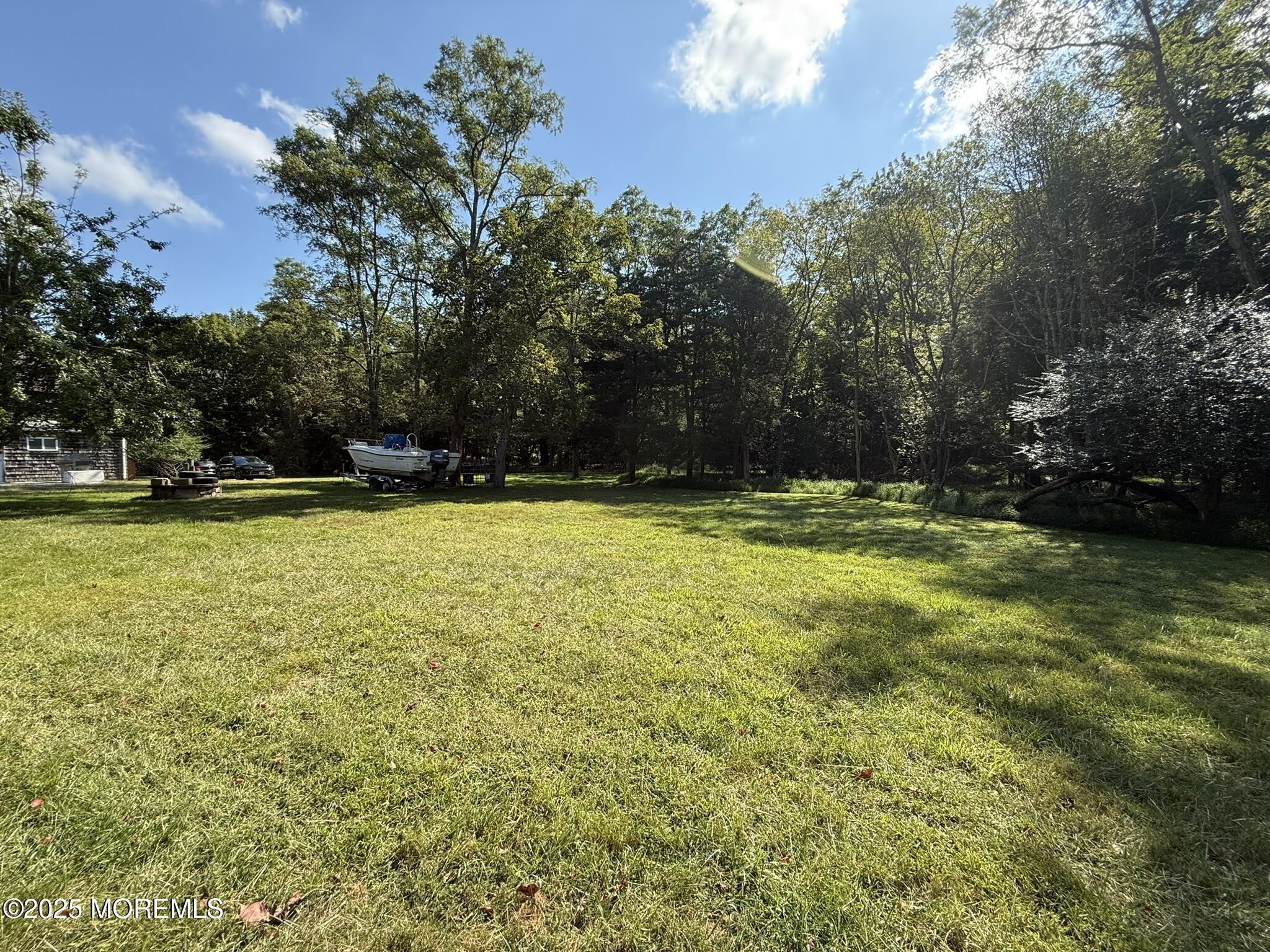 225 Jones Road, Unit 104 Barnegat, NJ 08005 - Photo 27 of 44 a view of swimming pool with an outdoor space