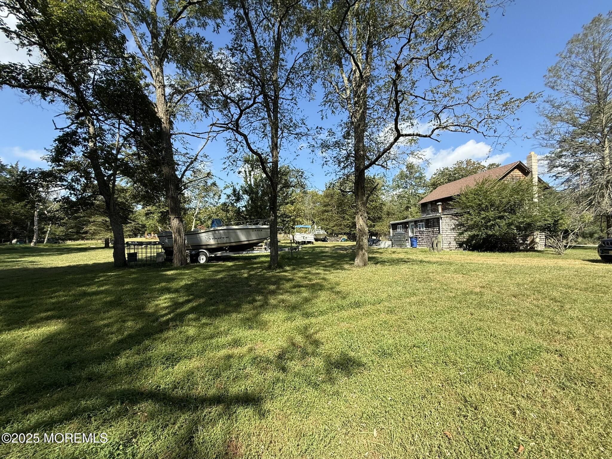 225 Jones Road, Unit 104 Barnegat, NJ 08005 - Photo 32 of 44 a view of a park with large trees