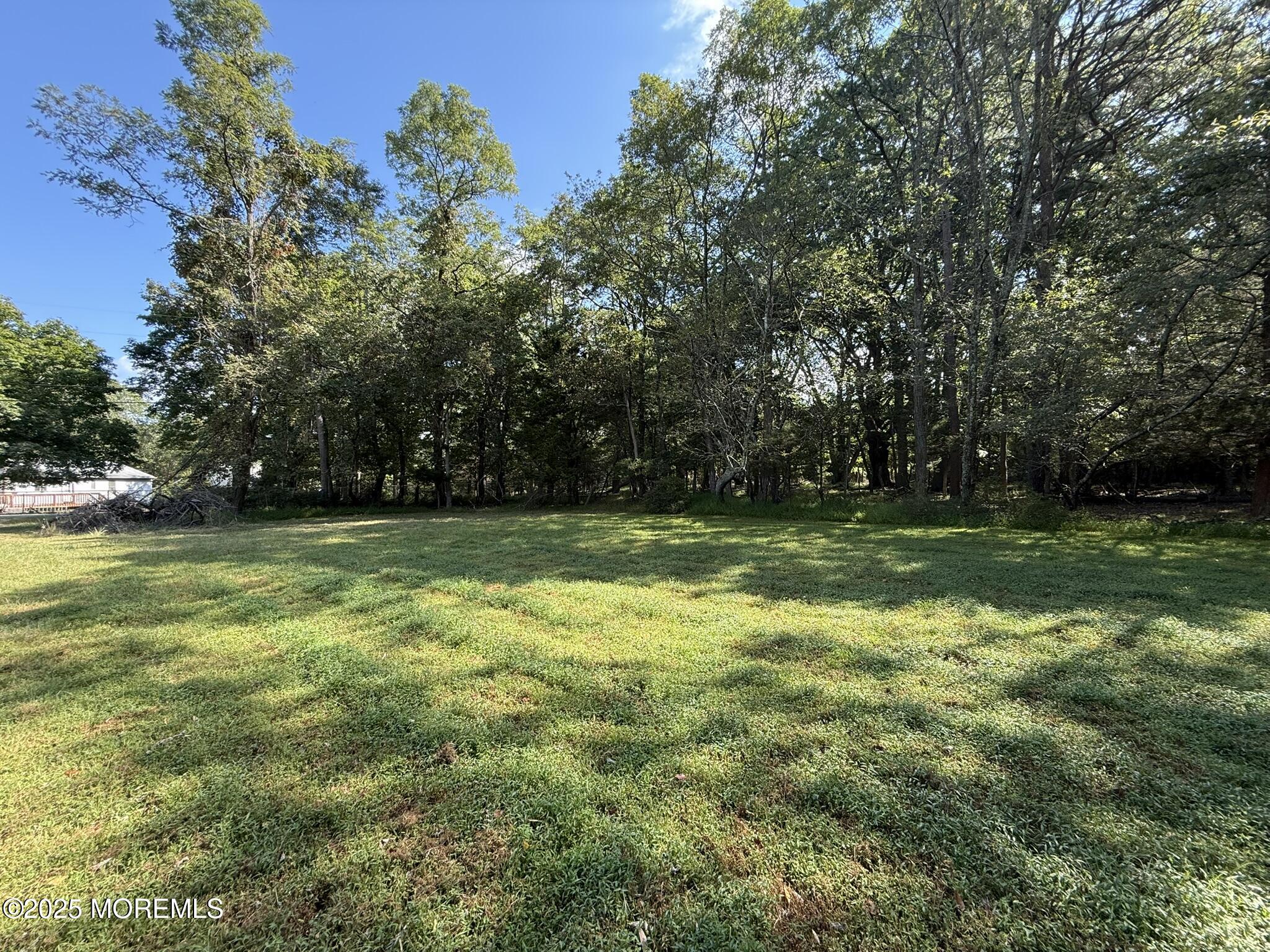 225 Jones Road, Unit 104 Barnegat, NJ 08005 - Photo 34 of 44 a view of outdoor space with a garden