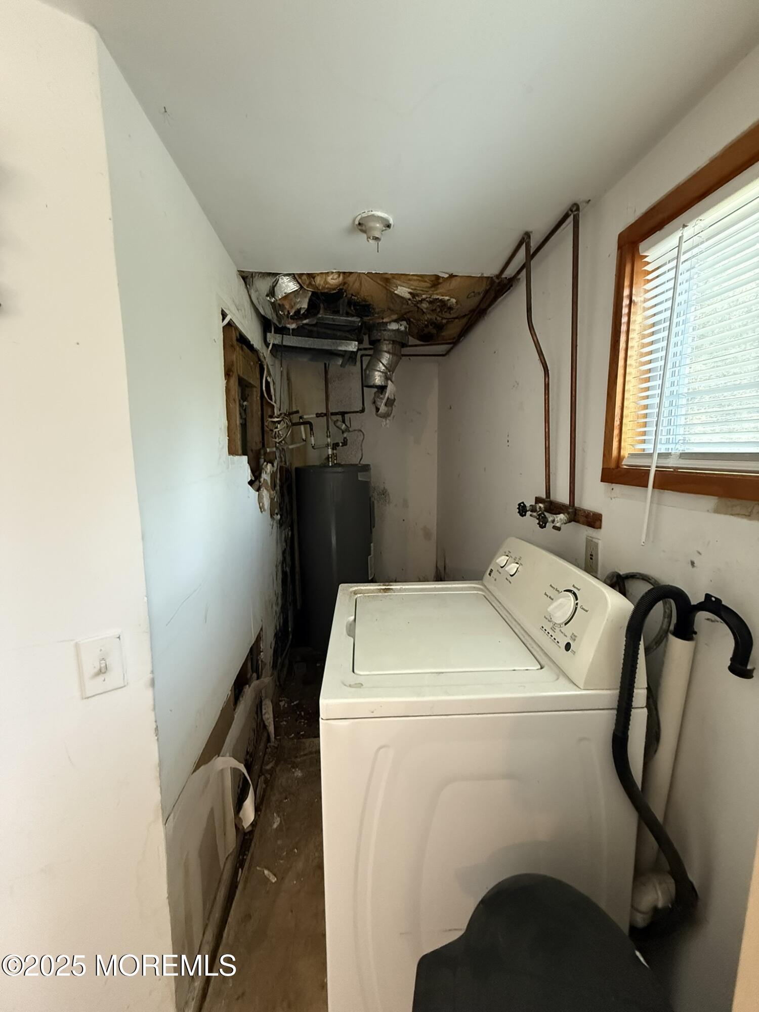225 Jones Road, Unit 104 Barnegat, NJ 08005 - Photo 7 of 44 a utility room with dryer and washer