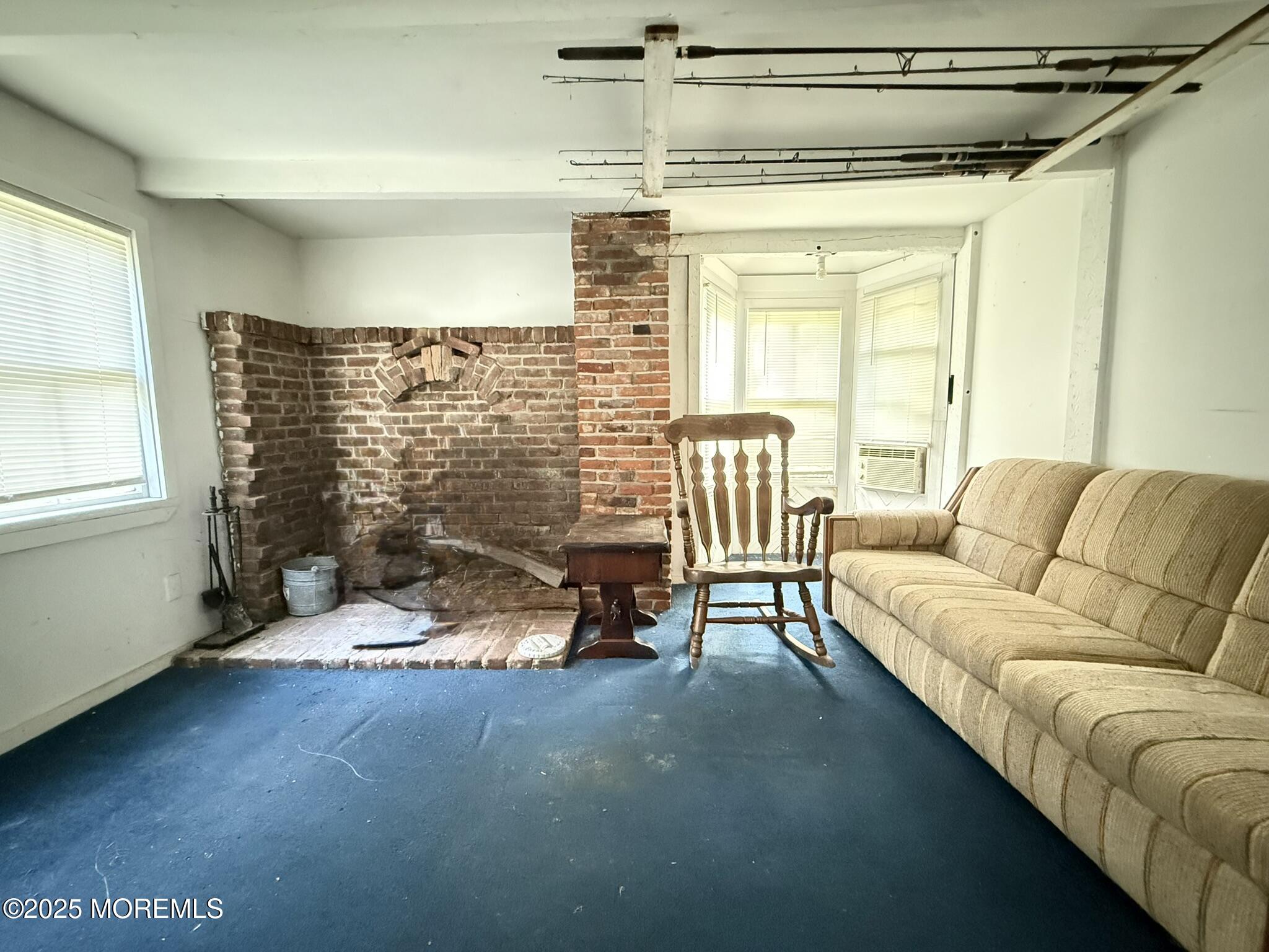 225 Jones Road, Unit 104 Barnegat, NJ 08005 - Photo 10 of 44 a living room with furniture and a window