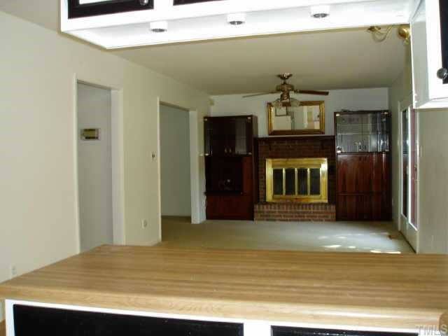 Family Room. Wood Burning fireplace.Entertainment center stays. Other
