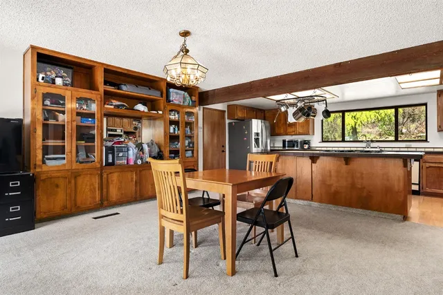 a bathroom with a toilet sink and shower