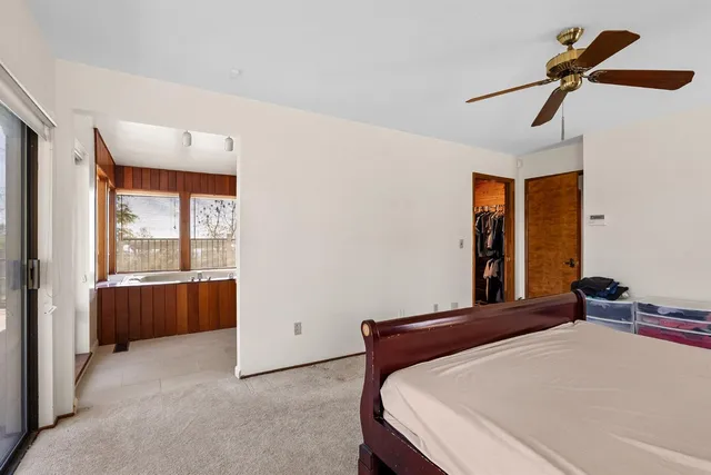 a bath tub sitting in front of a window