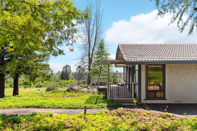 a front view of a house having yard