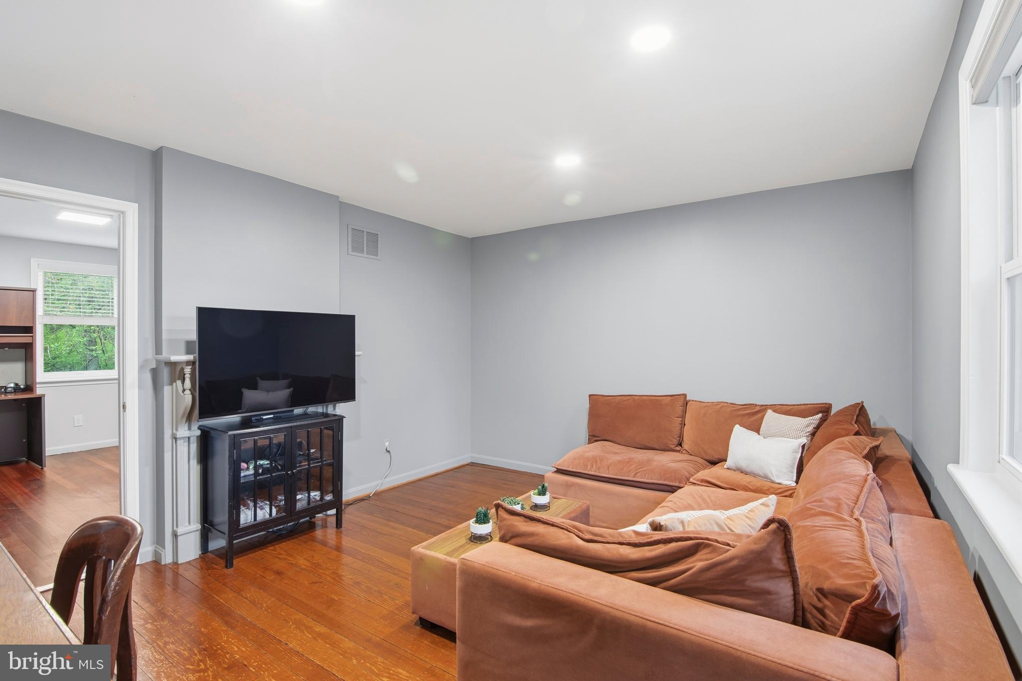 18708 York Road Parkton, MD 21120 - Photo 43 of 59 a living room with furniture and a flat screen tv
