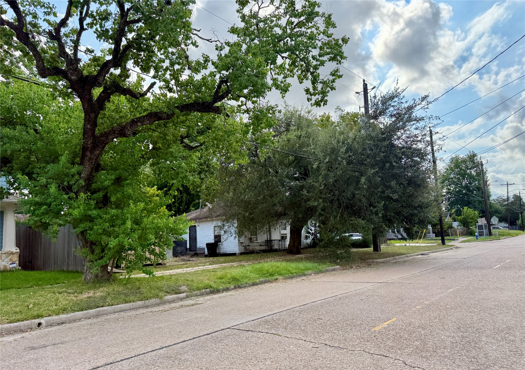 3420 Delano Street Houston, TX 77004 - Photo 4 of 9 a view of a house with a tree park