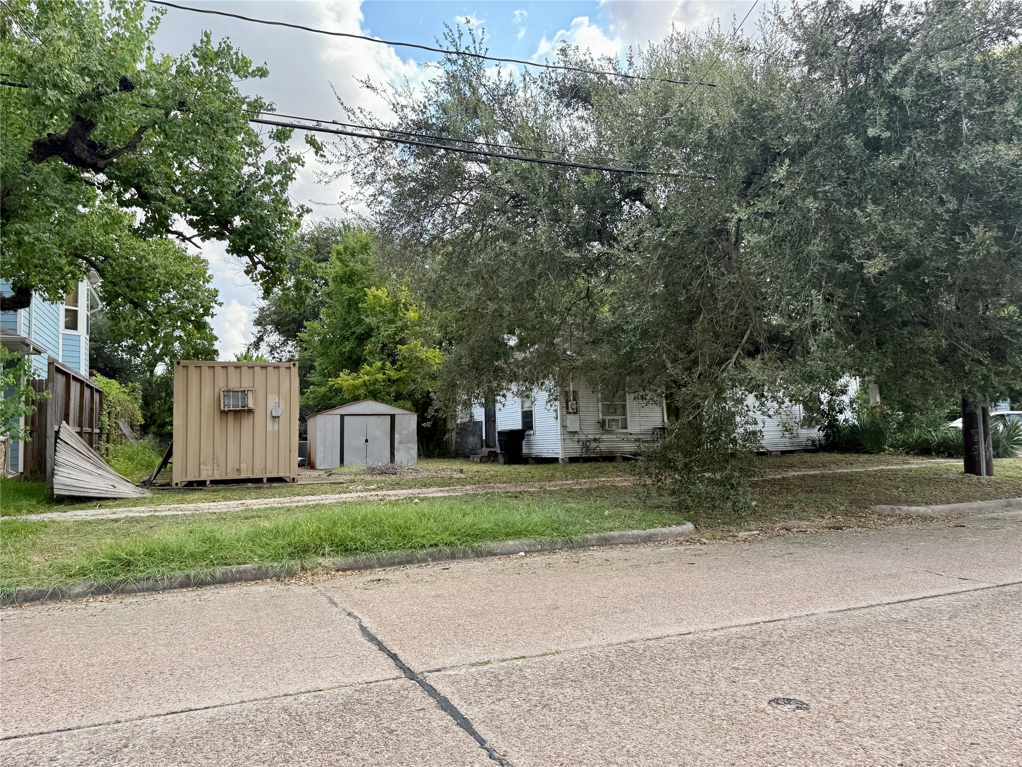3420 Delano Street Houston, TX 77004 - Photo 5 of 9 a front view of a house with a yard and garage