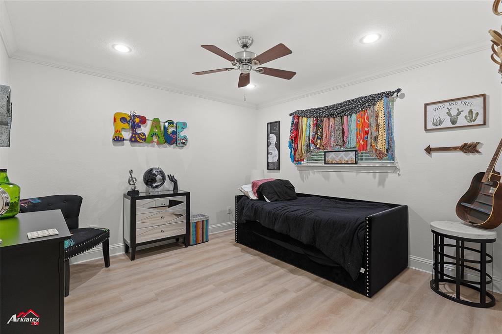 342 Merritt Road Benton, LA 71006 - Photo 20 of 38 a bedroom with a bed and furniture