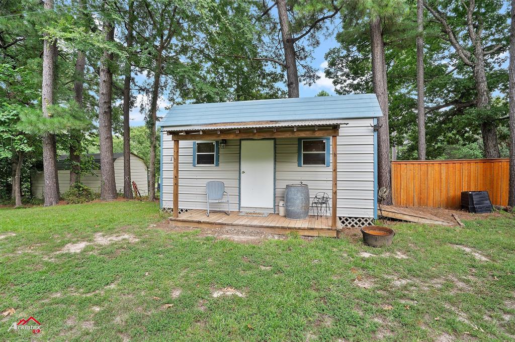 342 Merritt Road Benton, LA 71006 - Photo 27 of 38 front view of a house with a yard