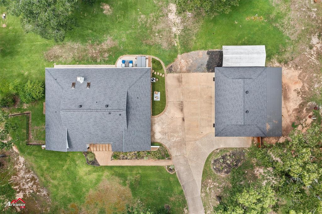 342 Merritt Road Benton, LA 71006 - Photo 29 of 38 an aerial view of a house with a backyard space and a large tree
