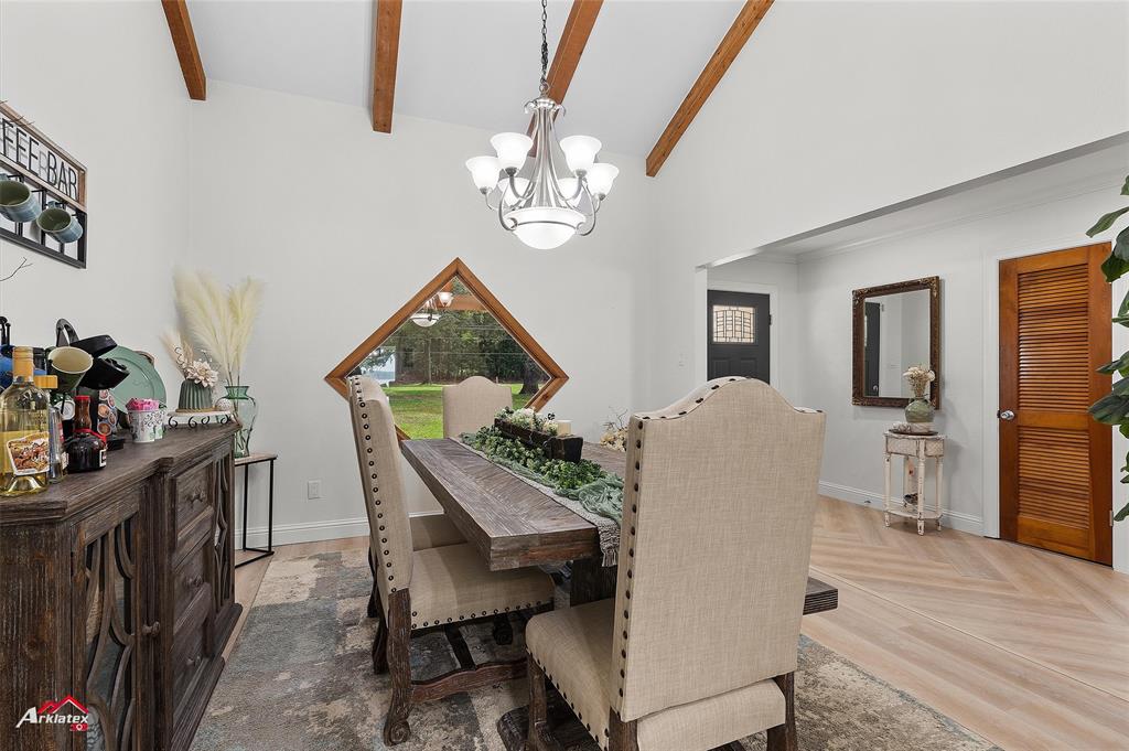 342 Merritt Road Benton, LA 71006 - Photo 6 of 38 a view of a dining room with furniture and wooden floor