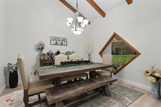 a view of entryway with a chandelier