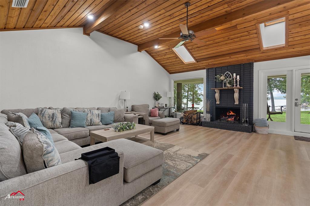 342 Merritt Road Benton, LA 71006 - Photo 9 of 38 a living room with furniture a ceiling fan and a window