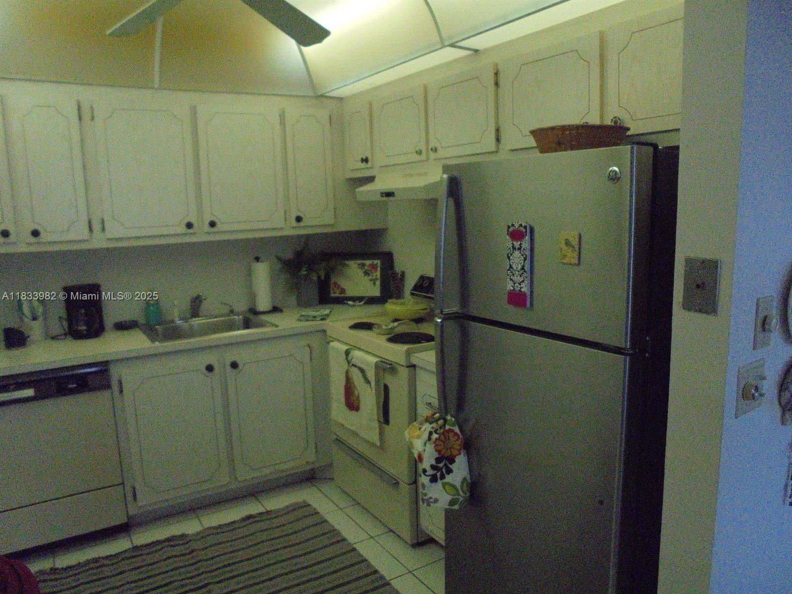 31 Fanshaw A, Unit 31A Boca Raton, FL 33434 - Photo 12 of 12 a utility room with dryer and washer