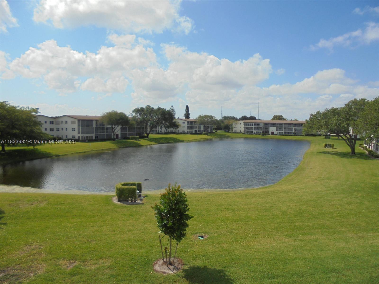 31 Fanshaw A, Unit 31A Boca Raton, FL 33434 - Photo 9 of 12 a view of a lake with a city