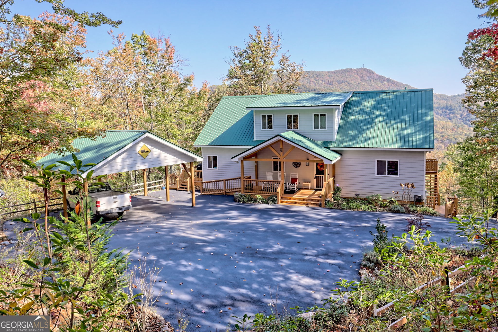 557 Walnut Grove Lane Tiger, GA 30576 - Photo 1 of 75 a front view of house with yard and seating area