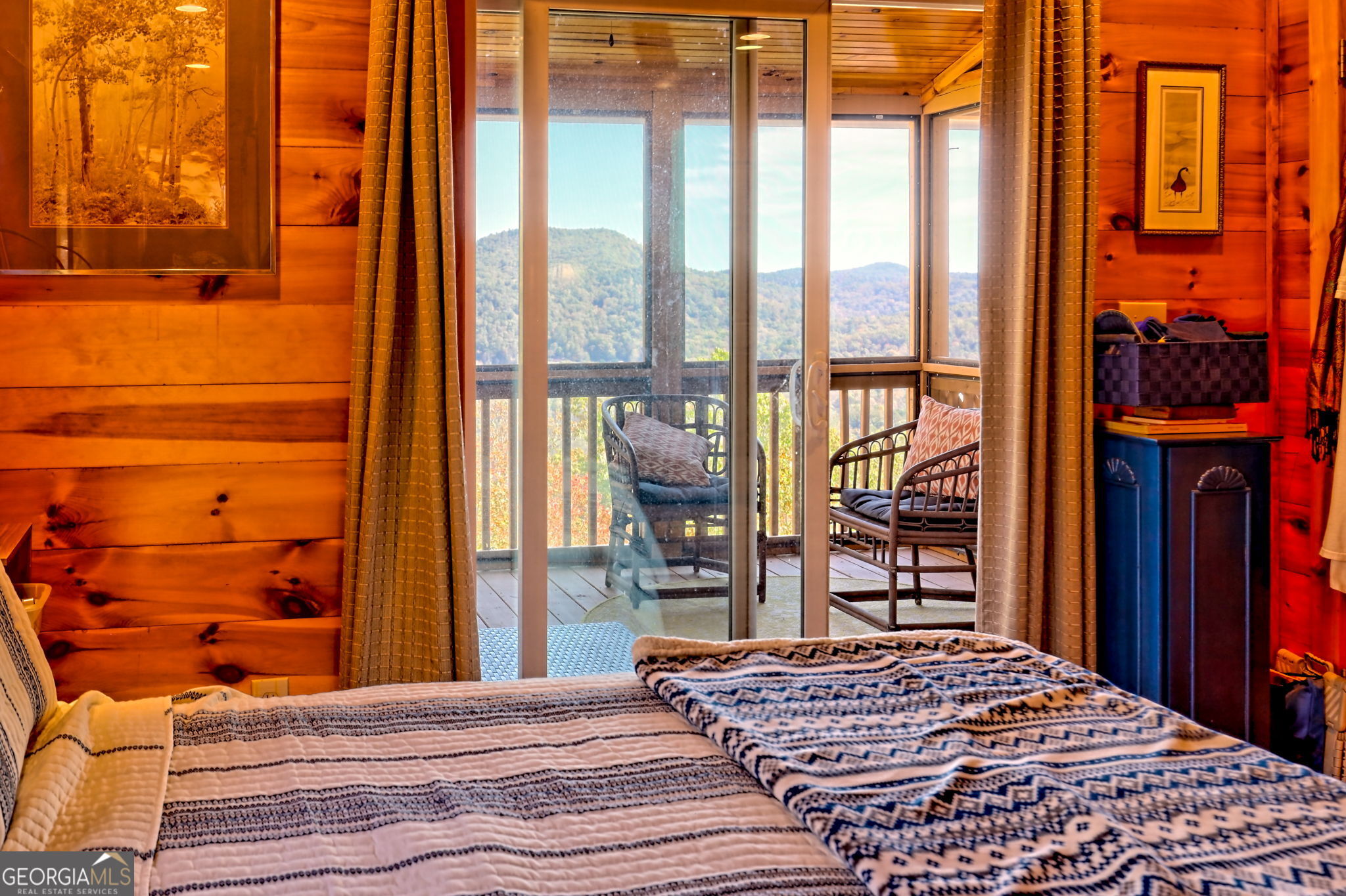 557 Walnut Grove Lane Tiger, GA 30576 - Photo 16 of 75 a bedroom with a bed and a window