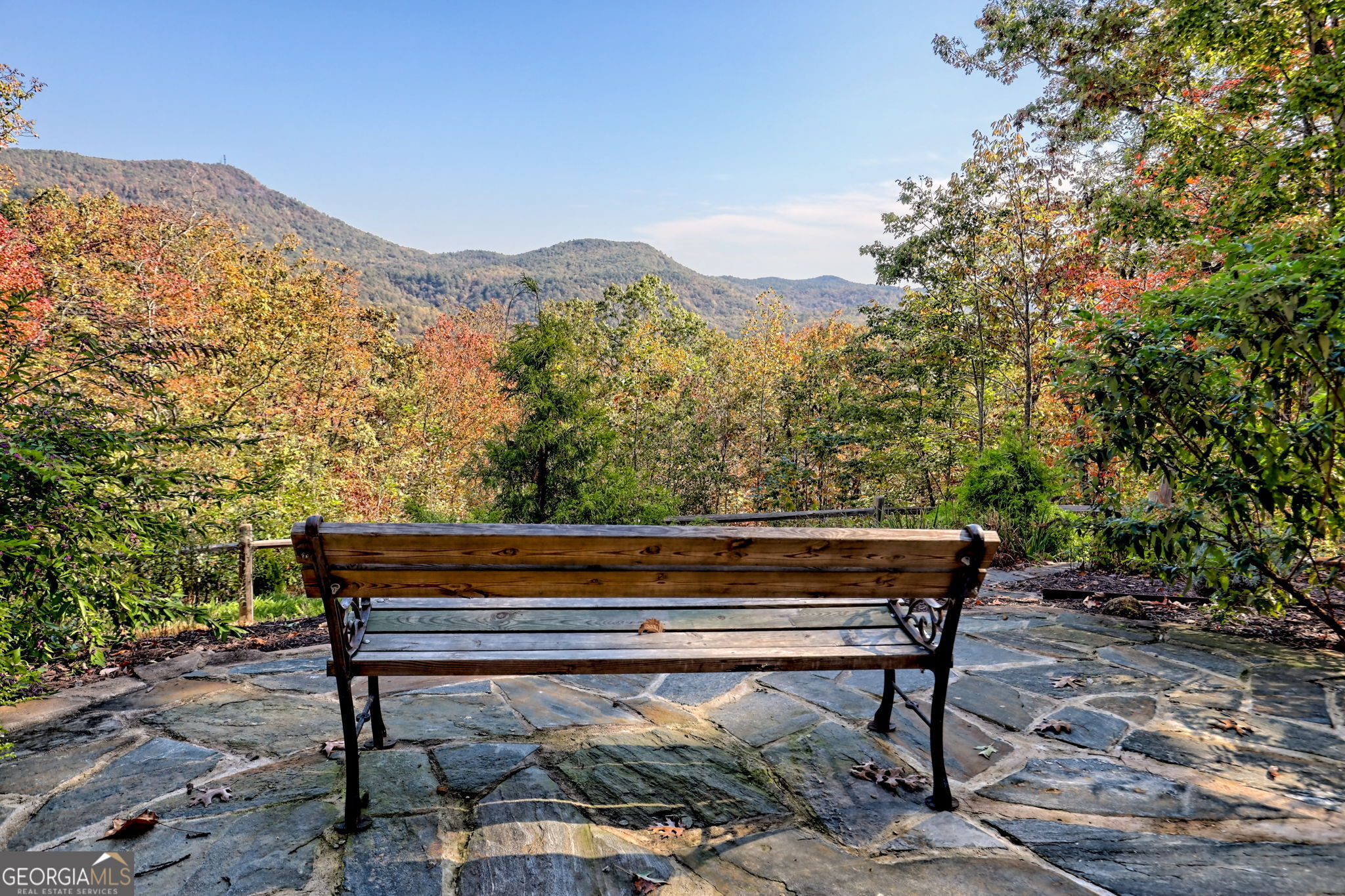 557 Walnut Grove Lane Tiger, GA 30576 - Photo 2 of 75 a view of a bench in a backyard