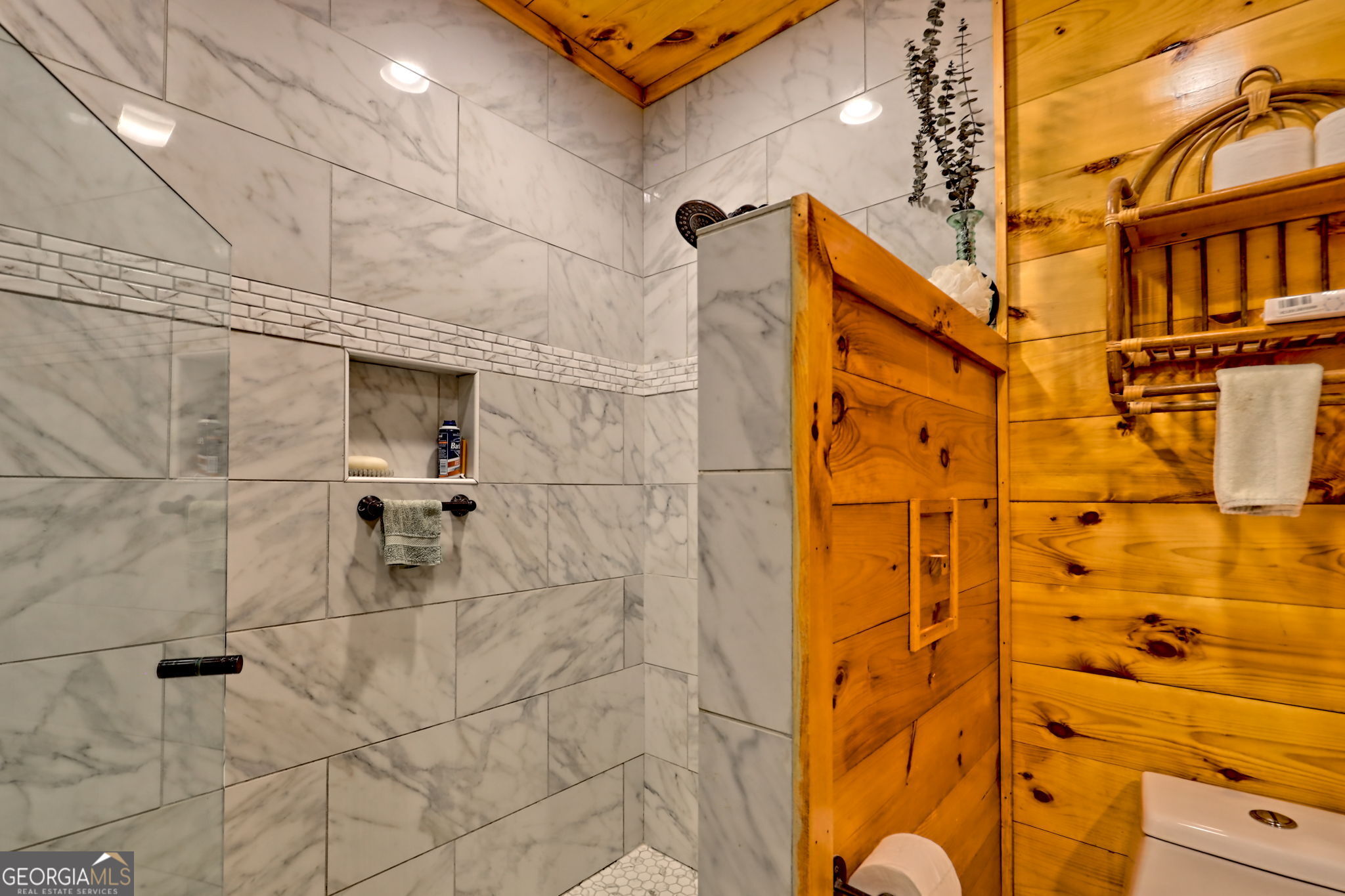 557 Walnut Grove Lane Tiger, GA 30576 - Photo 22 of 75 a bathroom with a shower