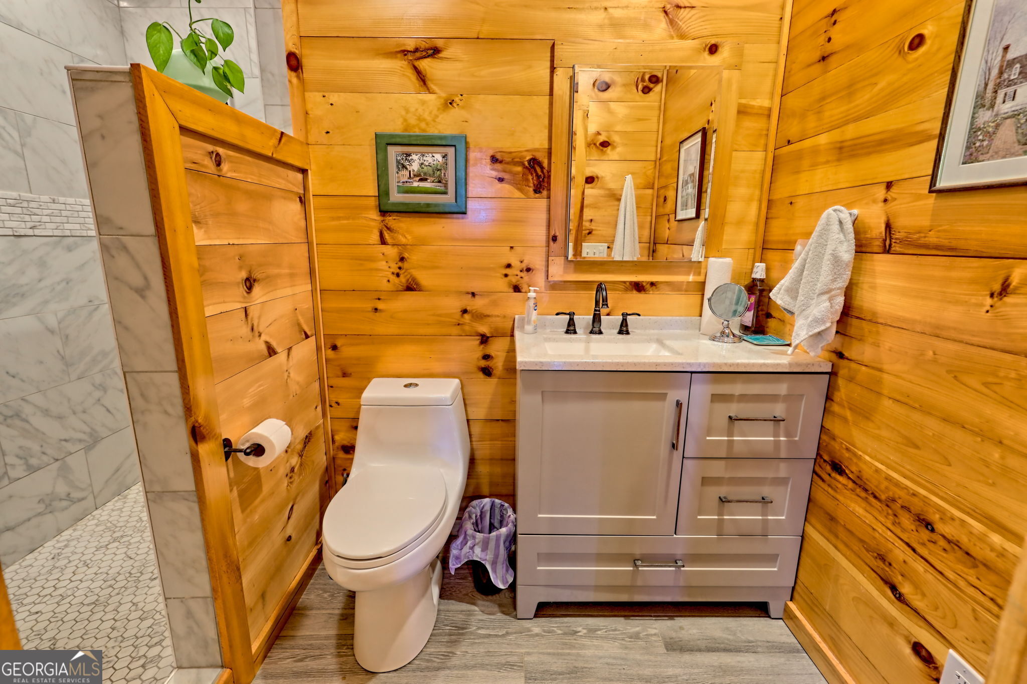 557 Walnut Grove Lane Tiger, GA 30576 - Photo 24 of 75 a bathroom with a sink toilet and shower