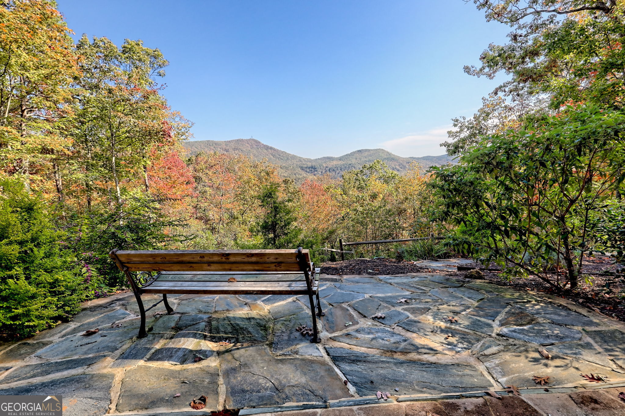 557 Walnut Grove Lane Tiger, GA 30576 - Photo 3 of 75 a view of a bench in a backyard