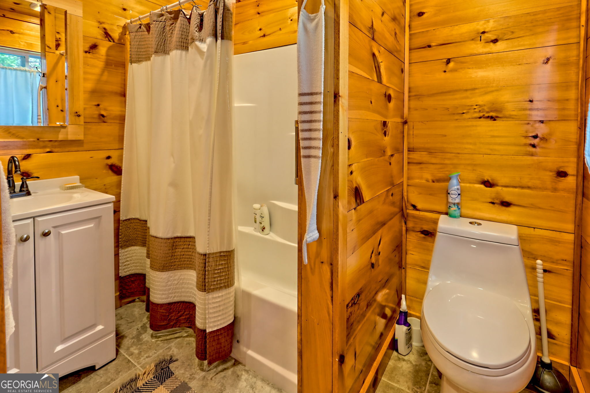557 Walnut Grove Lane Tiger, GA 30576 - Photo 40 of 75 a bathroom with a sink toilet and shower